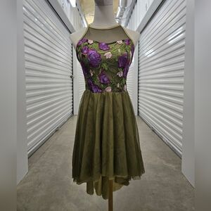 Green dance dress or figure skating dress